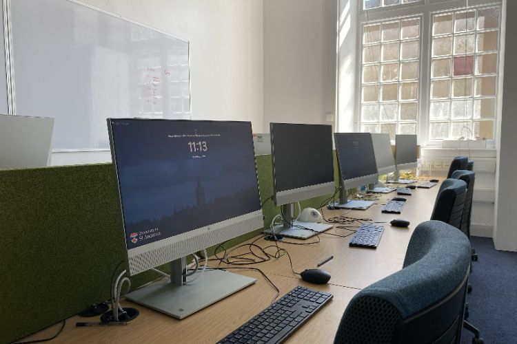 PCs and desks inside a PC classroom